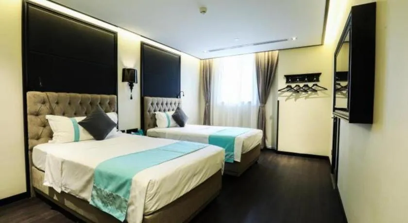 Bed in Xana Hotelle Beijing Olympic Park South Lishuiqiao Metro Station