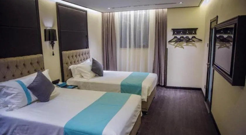 Bed in Xana Hotelle Beijing Olympic Park South Lishuiqiao Metro Station