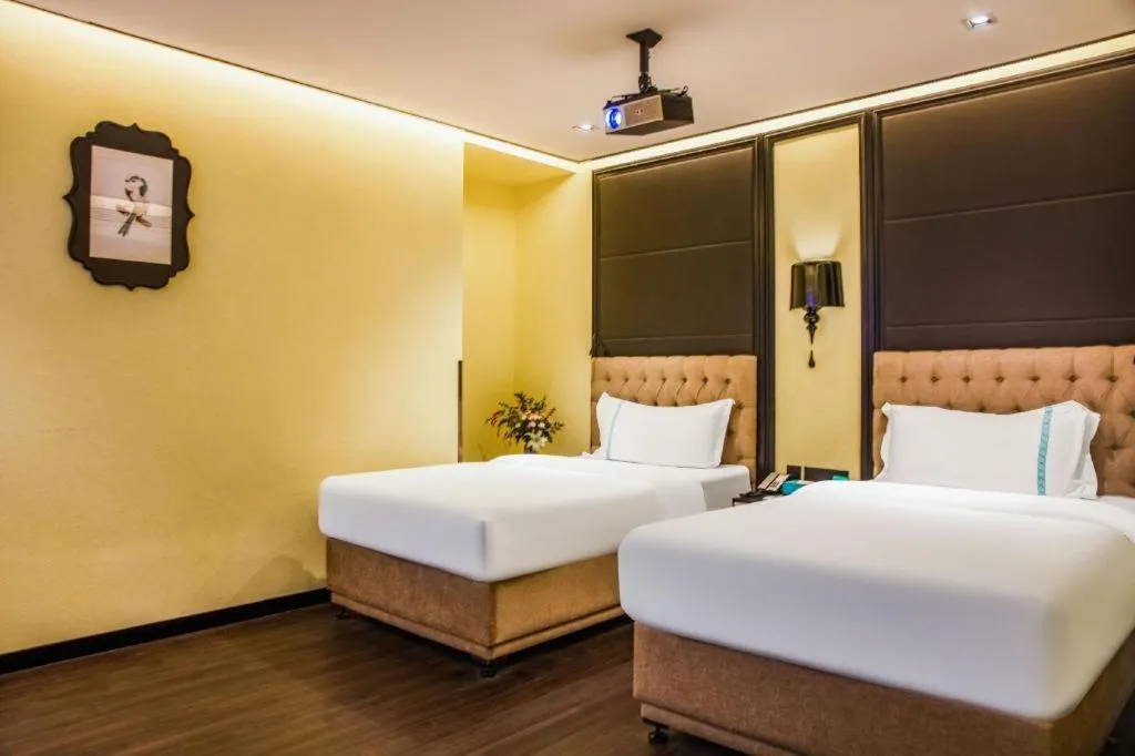 Bed in Xana Hotelle Beijing Olympic Park South Lishuiqiao Metro Station