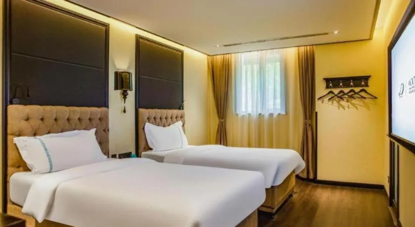 Bed in Xana Hotelle Beijing Olympic Park South Lishuiqiao Metro Station