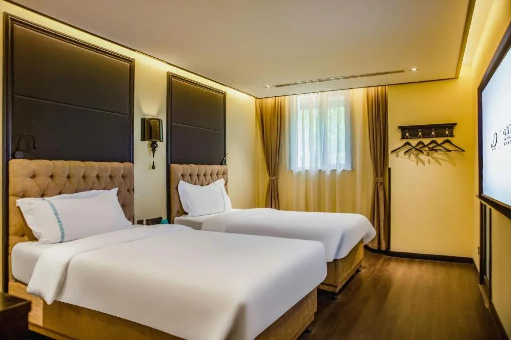 Bed in Xana Hotelle Beijing Olympic Park South Lishuiqiao Metro Station