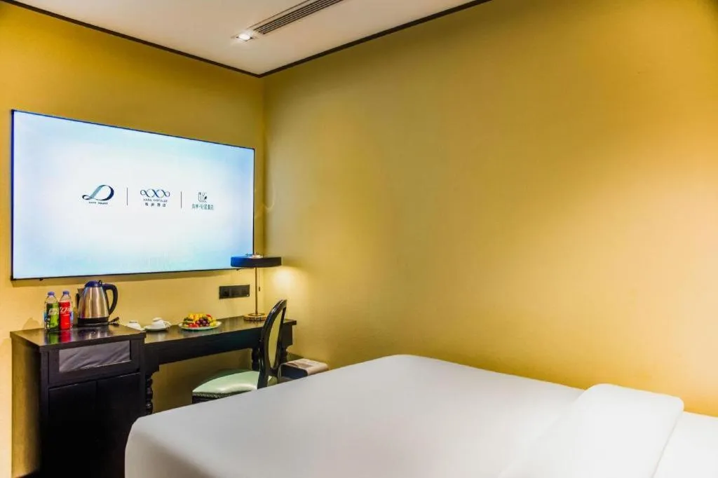 Bed in Xana Hotelle Beijing Olympic Park South Lishuiqiao Metro Station