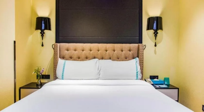 Bed in Xana Hotelle Beijing Olympic Park South Lishuiqiao Metro Station