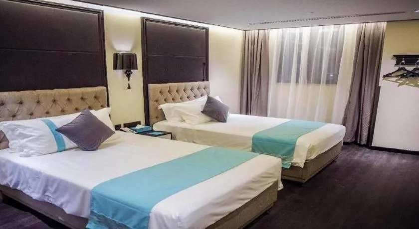 Bed in Xana Hotelle Beijing Olympic Park South Lishuiqiao Metro Station