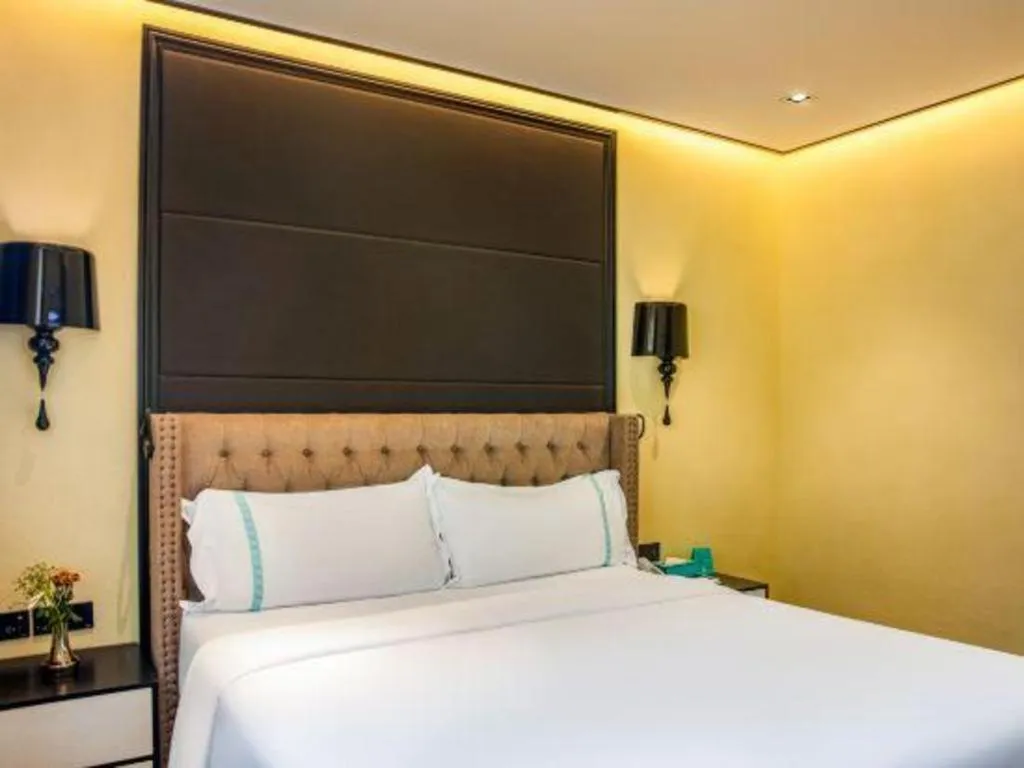 Bed in Xana Hotelle Beijing Olympic Park South Lishuiqiao Metro Station