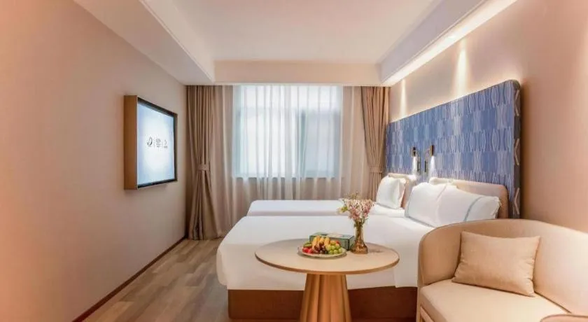 Bed in Xana Hotelle Beijing Olympic Park South Lishuiqiao Metro Station