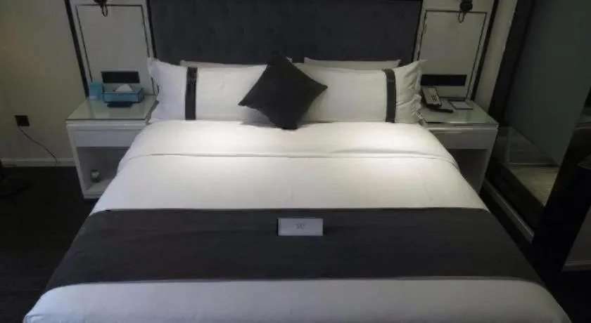 Bed in Xana Hotelle Neijiang City Center Branch