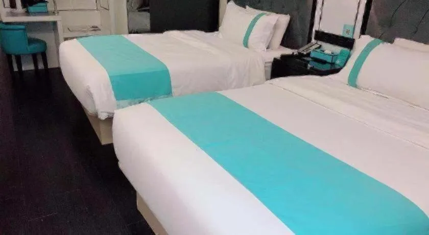 Bed in Xana Hotelle Neijiang City Center Branch