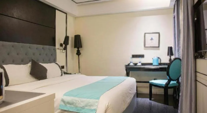 Bed in Xana Hotelle Neijiang City Center Branch