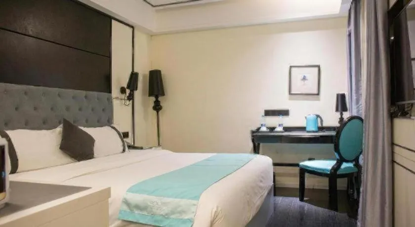 Bed in Xana Hotelle Neijiang City Center Branch