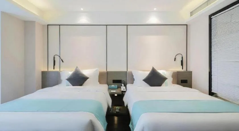 Bed in Xana Lite Guiyang Huaguoyuan Shuangzi Towers