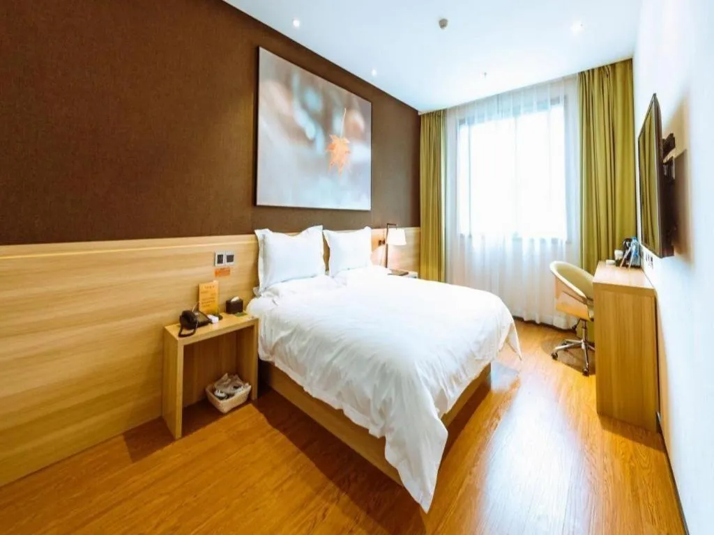 Bed in IU Hotel Chongqing Jiangbei International Airport