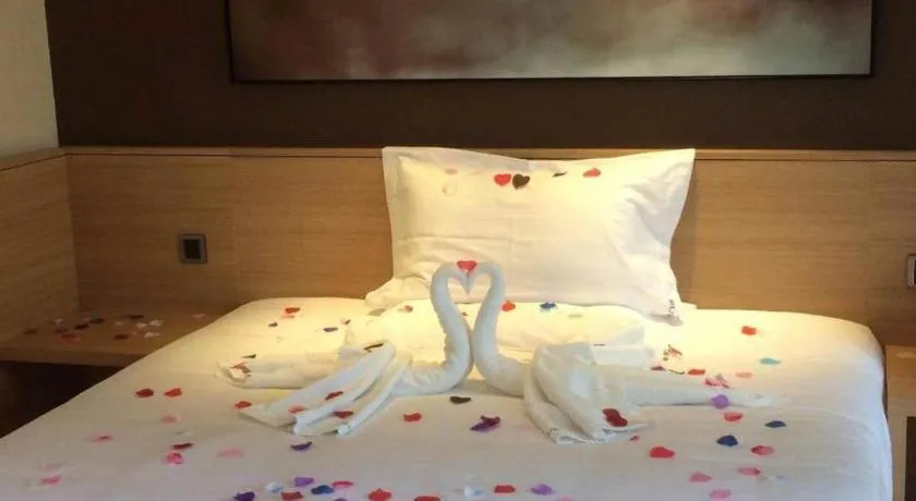 Bed in IU Hotel Chongqing Jiangbei International Airport