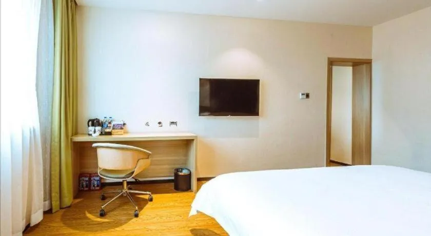 Bed in IU Hotel Chongqing Jiangbei International Airport