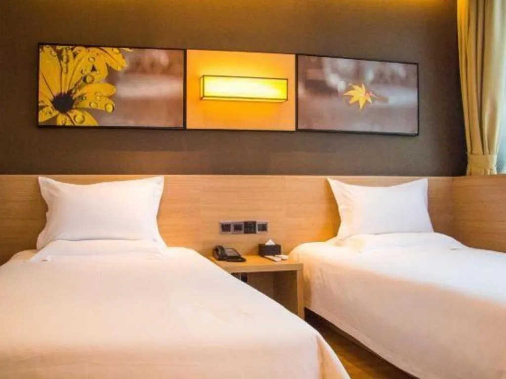 Bed in IU Hotel Chongqing Jiangbei International Airport