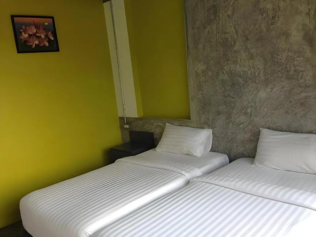 Bed in Pornsiri Hotel Sisaket