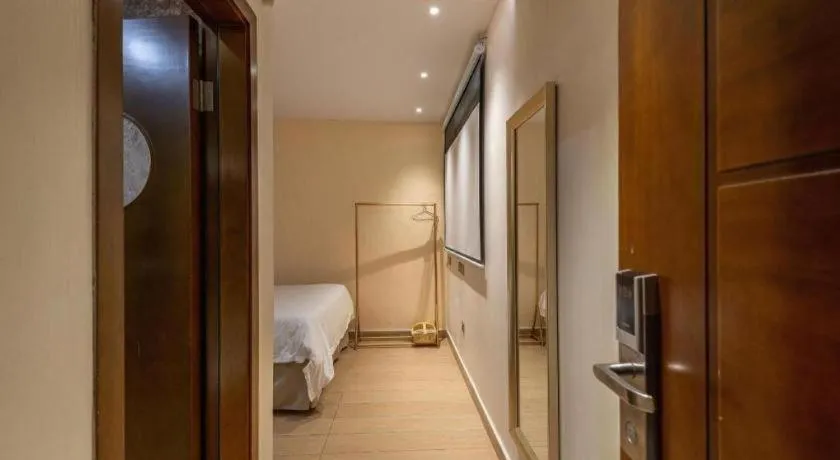 Bed in Leisurely Hotel Shenzhen