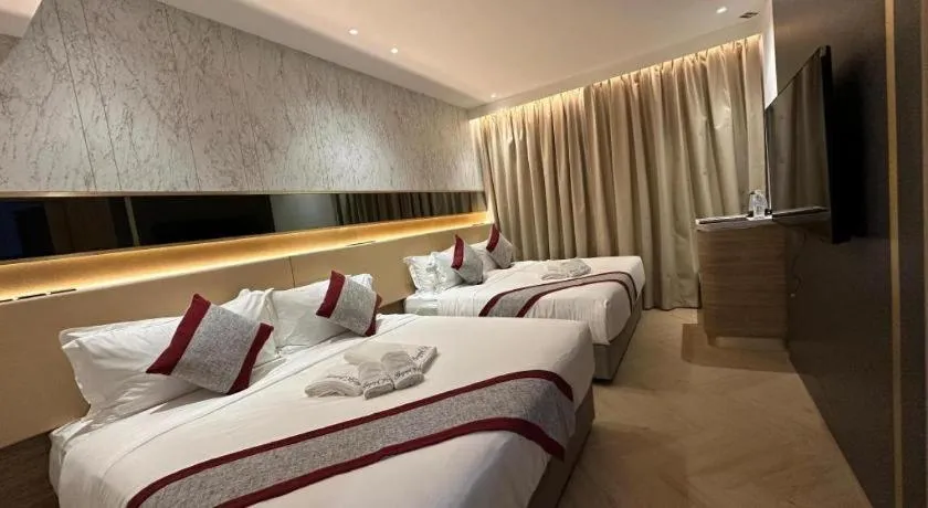 Bed in Grand City Hotel