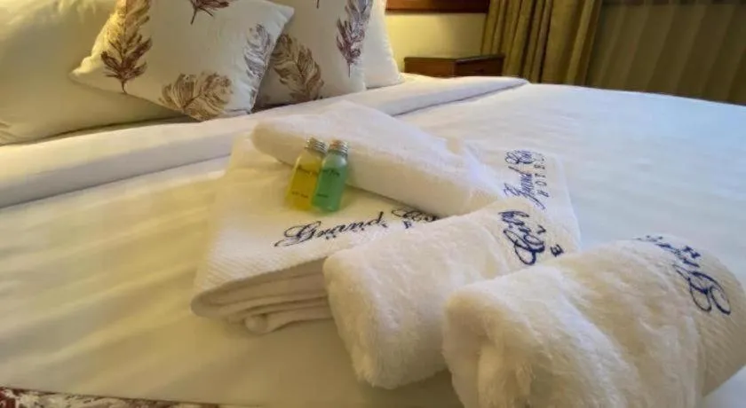 Bed in Grand City Hotel