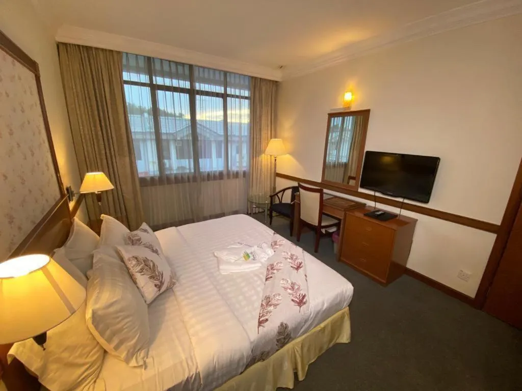 Bed in Grand City Hotel