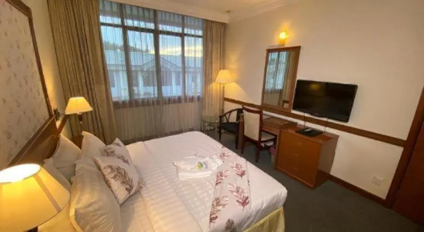 Bed in Grand City Hotel