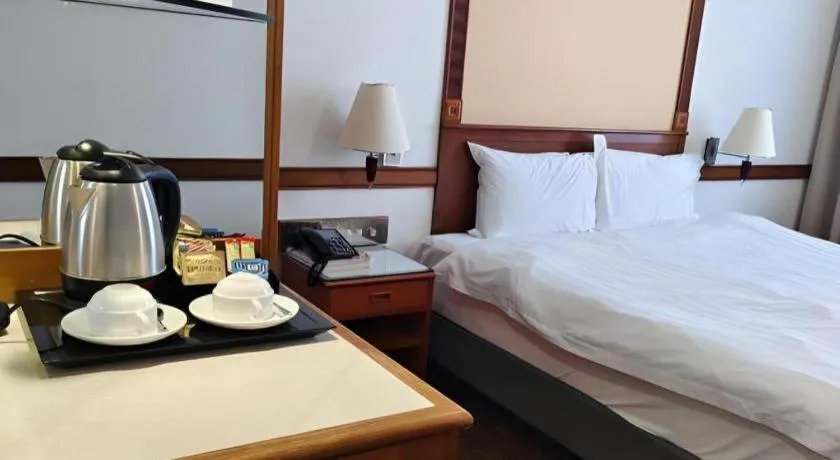 Bed in Grand City Hotel