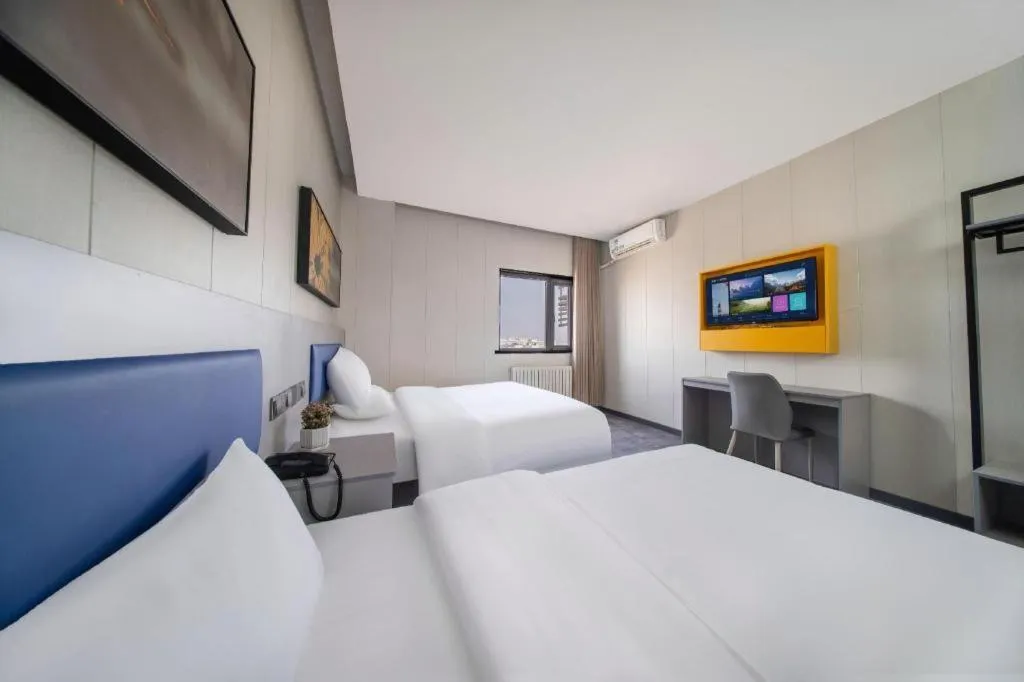 Bed in 7 Days Inn Tai'an Dongpingxi Hualian