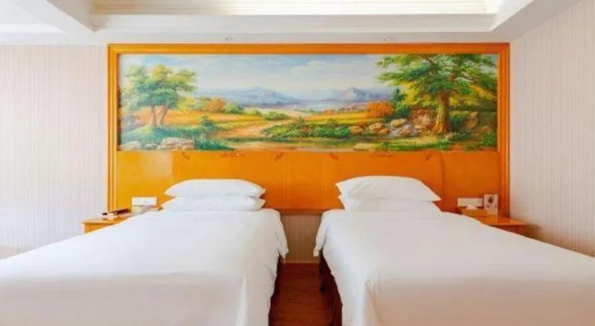 Bed in Vienna International Hotel Kunming Guangfu Road Aegean Shopping Center