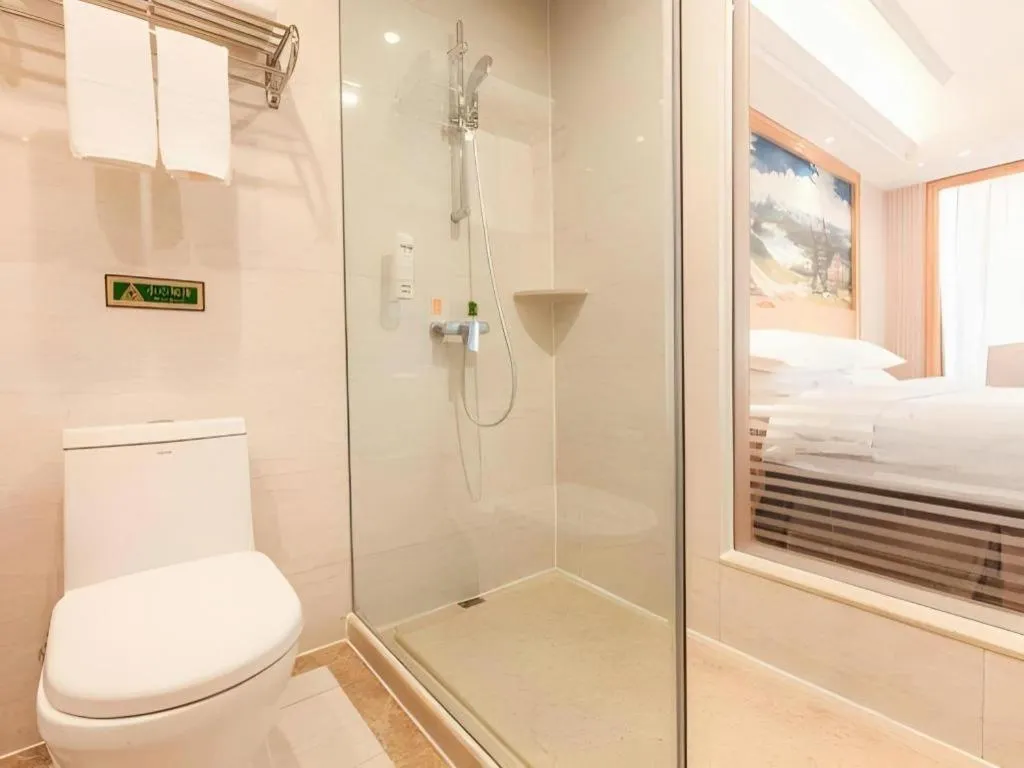 Bed in Vienna International Hotel Kunming Guangfu Road Aegean Shopping Center