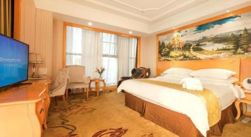 Bed in Vienna International Hotel Kunming Guangfu Road Aegean Shopping Center