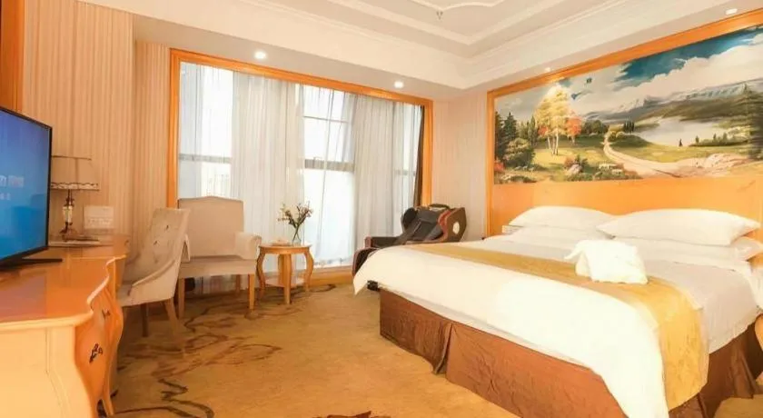 Bed in Vienna International Hotel Kunming Guangfu Road Aegean Shopping Center