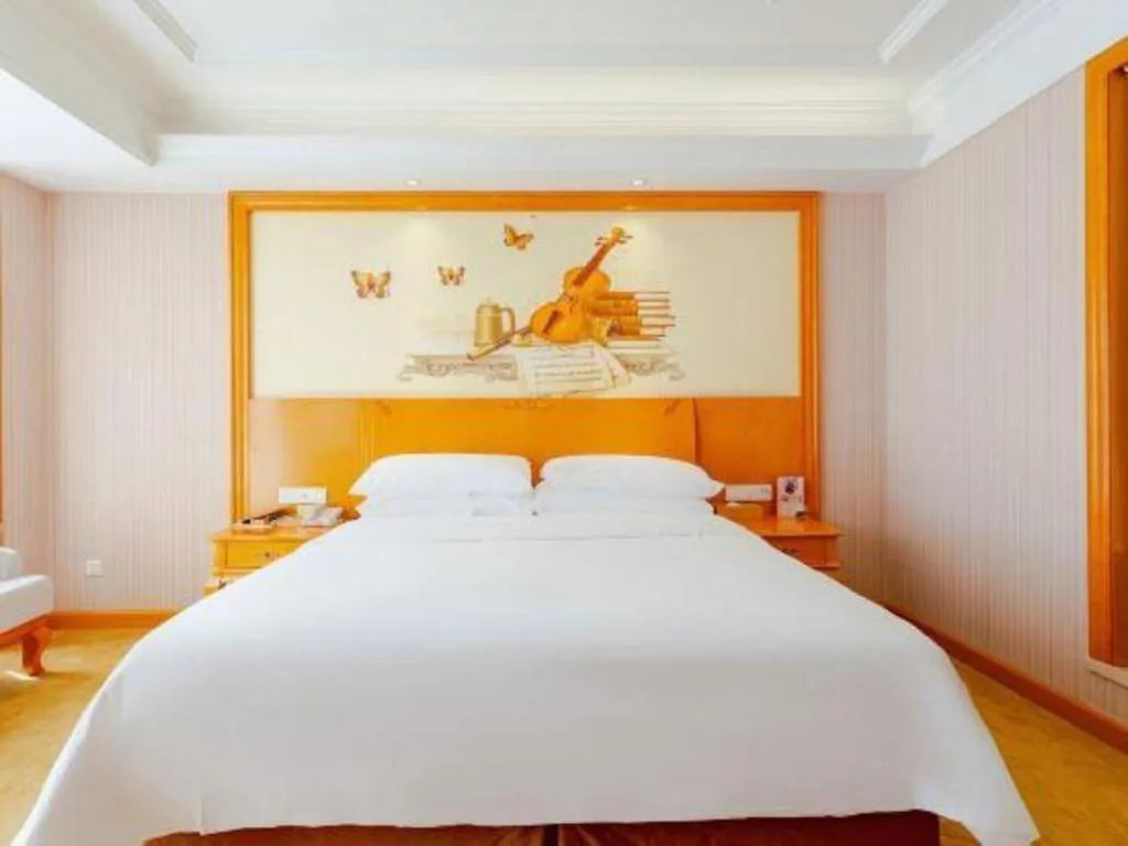 Bed in Vienna International Hotel Kunming Guangfu Road Aegean Shopping Center