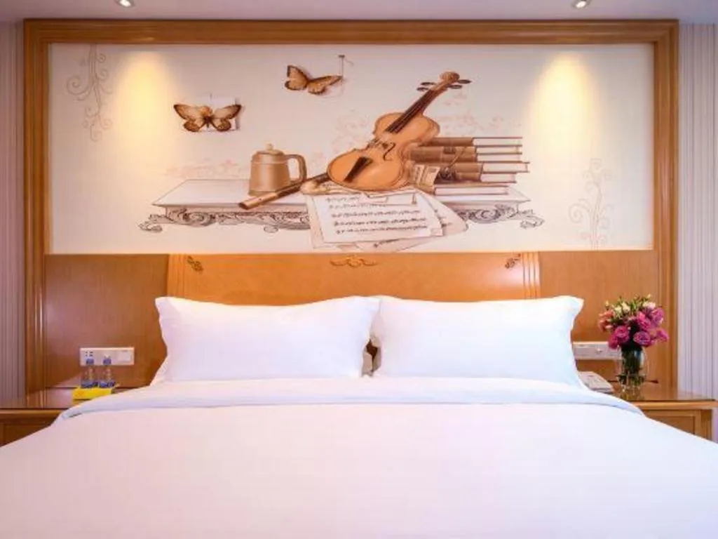 Bed in Vienna International Hotel Kunming Guangfu Road Aegean Shopping Center