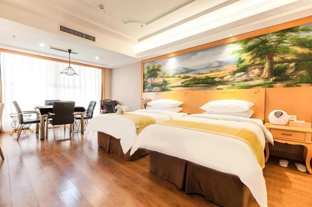 Bed in Vienna International Hotel Kunming Guangfu Road Aegean Shopping Center