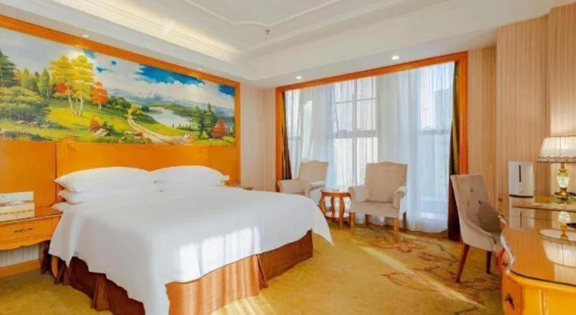 Bed in Vienna International Hotel Kunming Guangfu Road Aegean Shopping Center