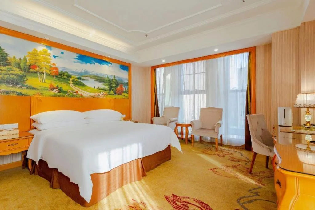 Bed in Vienna International Hotel Kunming Guangfu Road Aegean Shopping Center