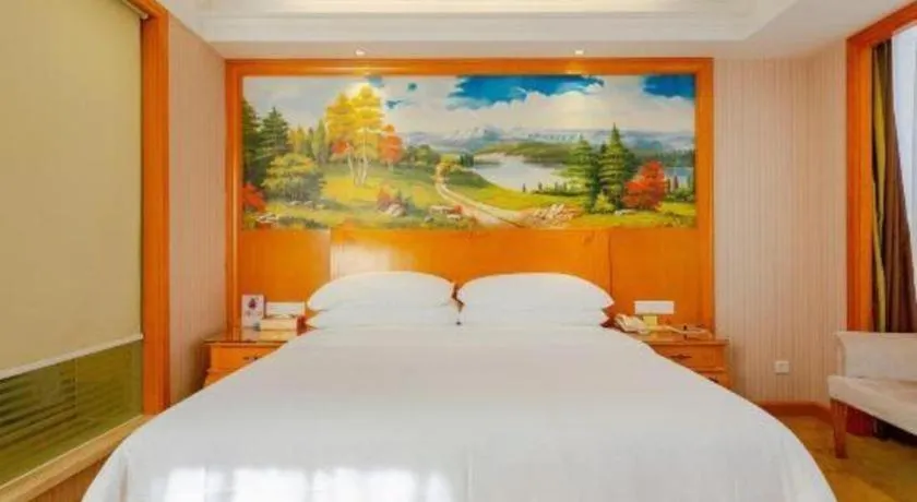 Bed in Vienna International Hotel Kunming Guangfu Road Aegean Shopping Center