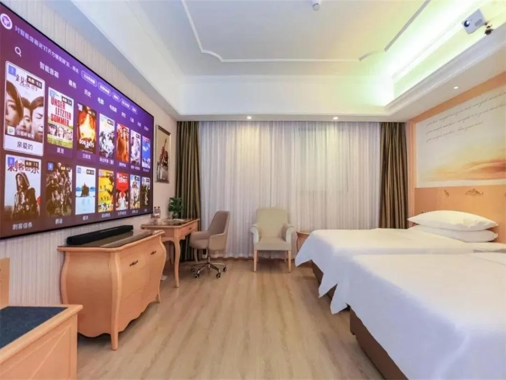 Bed in Vienna Hotel Guangzhou Airport Gaosu Pingsha
