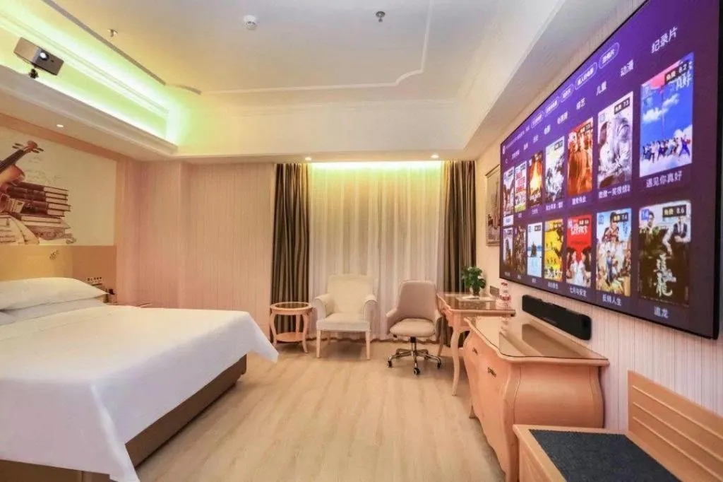 Bed in Vienna Hotel Guangzhou Airport Gaosu Pingsha
