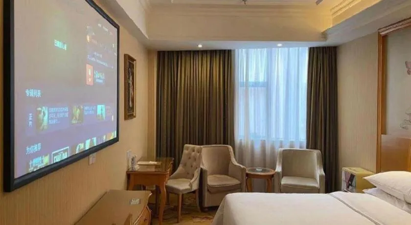 Bed in Vienna Hotel Guangzhou Airport Gaosu Pingsha