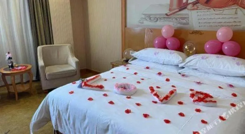 Bed in Vienna Hotel Guangzhou Airport Gaosu Pingsha