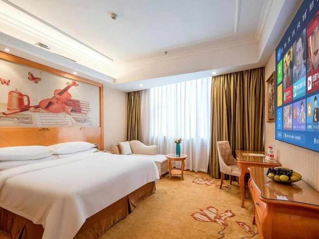 Bed in Vienna Hotel Guangzhou Airport Gaosu Pingsha