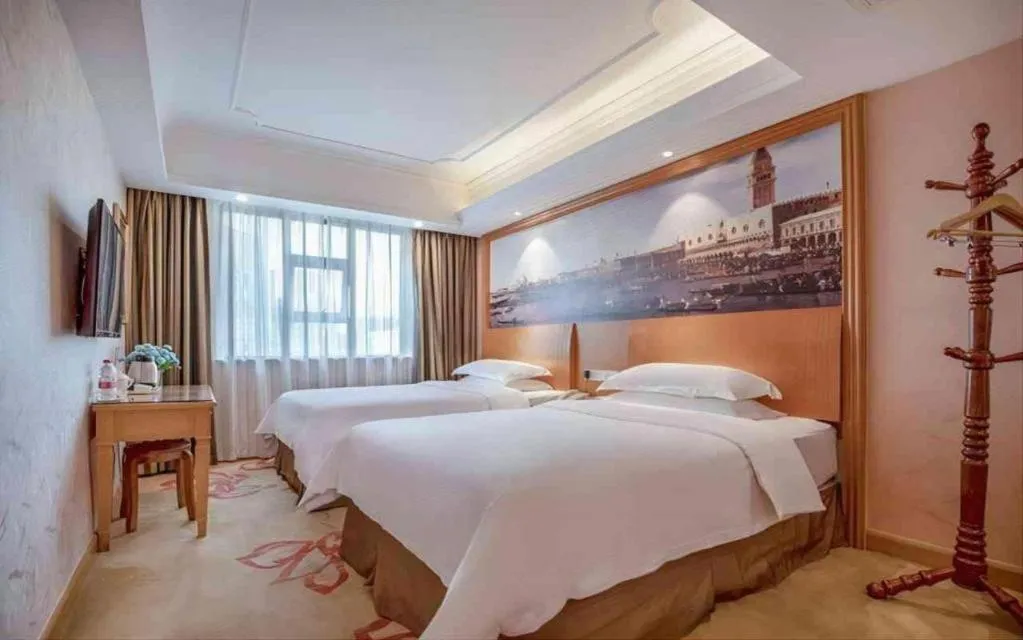 Bed in Vienna Hotel Changsha Wuyi Avenue Railway Station