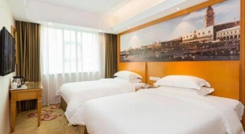 Bed in Vienna Hotel Changsha Wuyi Avenue Railway Station