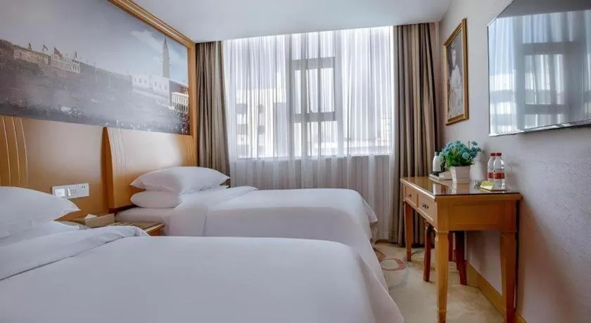 Bed in Vienna Hotel Changsha Wuyi Avenue Railway Station