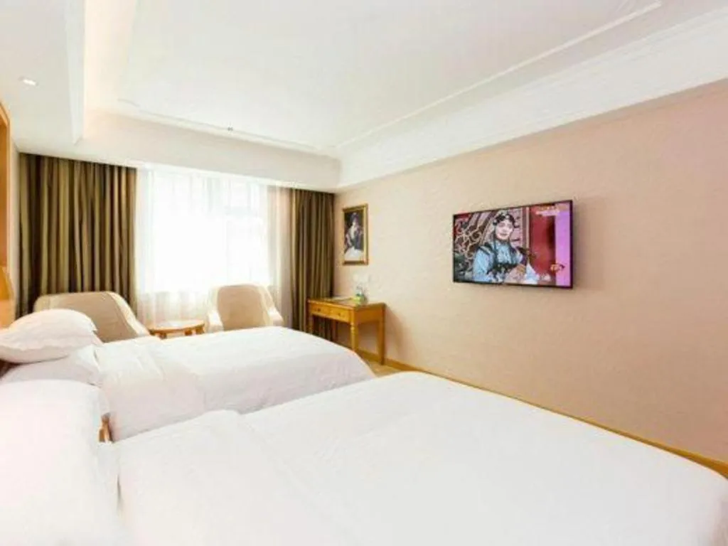 Bed in Vienna Hotel Changsha Wuyi Avenue Railway Station