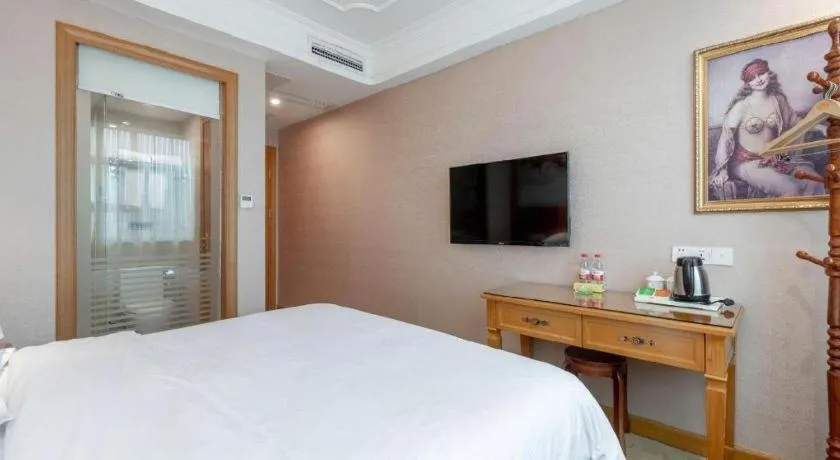 Bed in Vienna Hotel Changsha Wuyi Avenue Railway Station