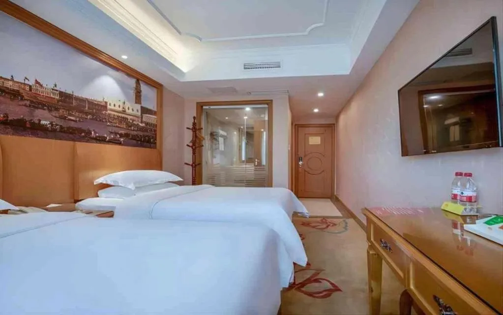 Bed in Vienna Hotel Changsha Wuyi Avenue Railway Station