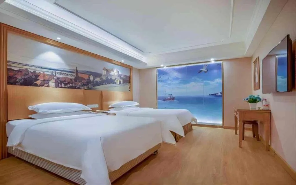 Bed in Vienna Hotel Changsha Wuyi Avenue Railway Station