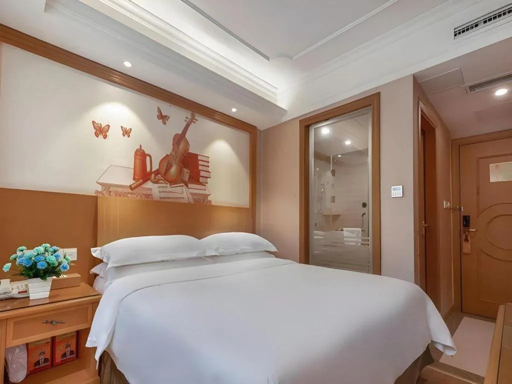 Bed in Vienna Hotel Changsha Wuyi Avenue Railway Station